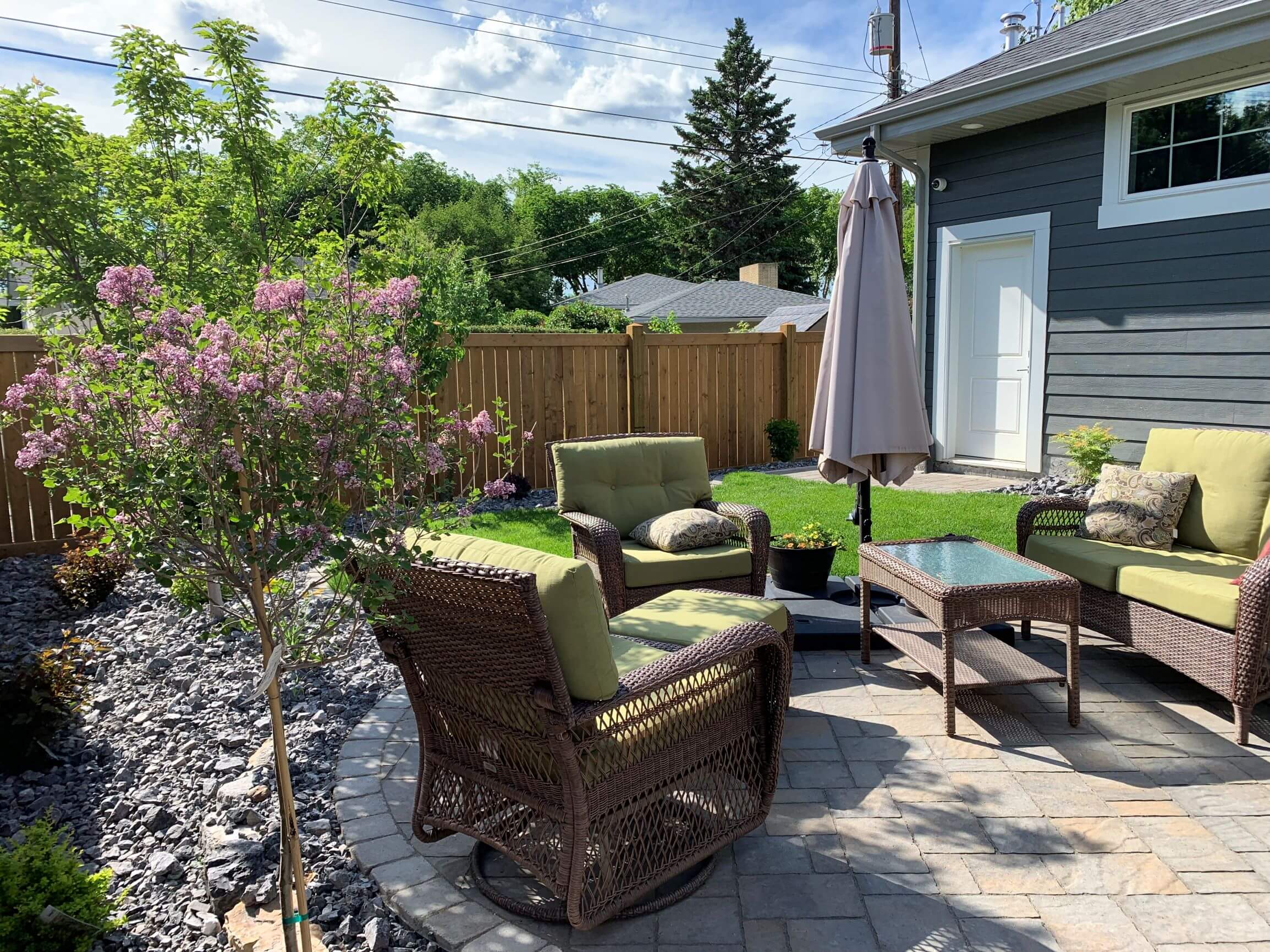 Outdoor living space landscaped by Isle Group